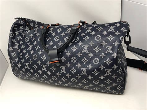 louis vuitton upside down logo bag|Louis Vuitton one sided.